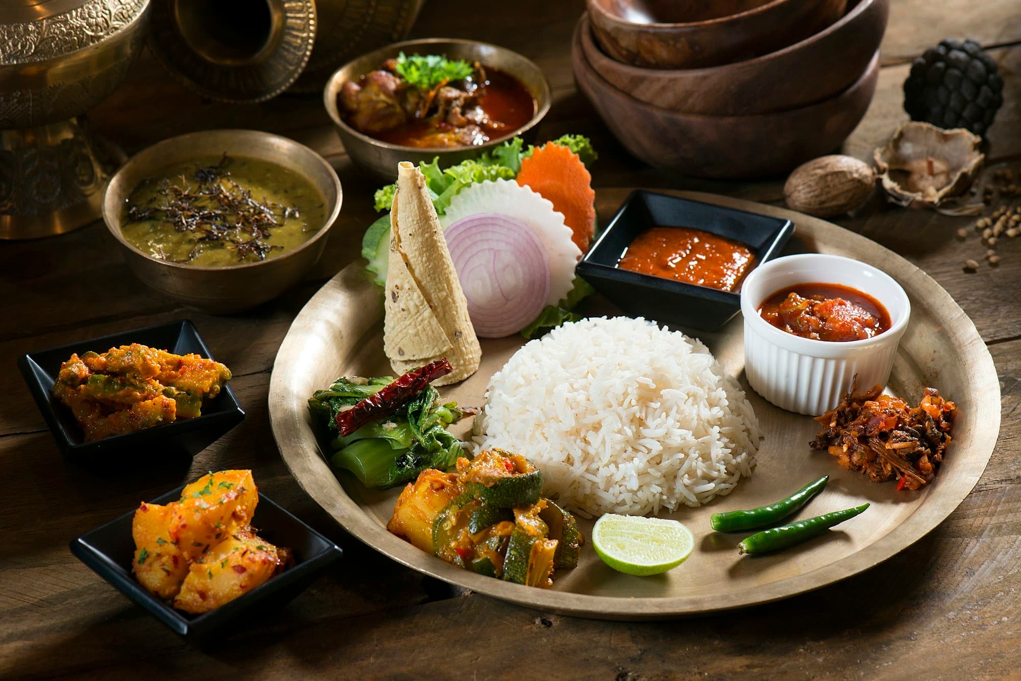 A Himachali thali served on a brass plate